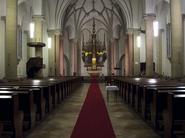 Church of Corpus Christi in Berlin with view from behind through the nave towards the altar.